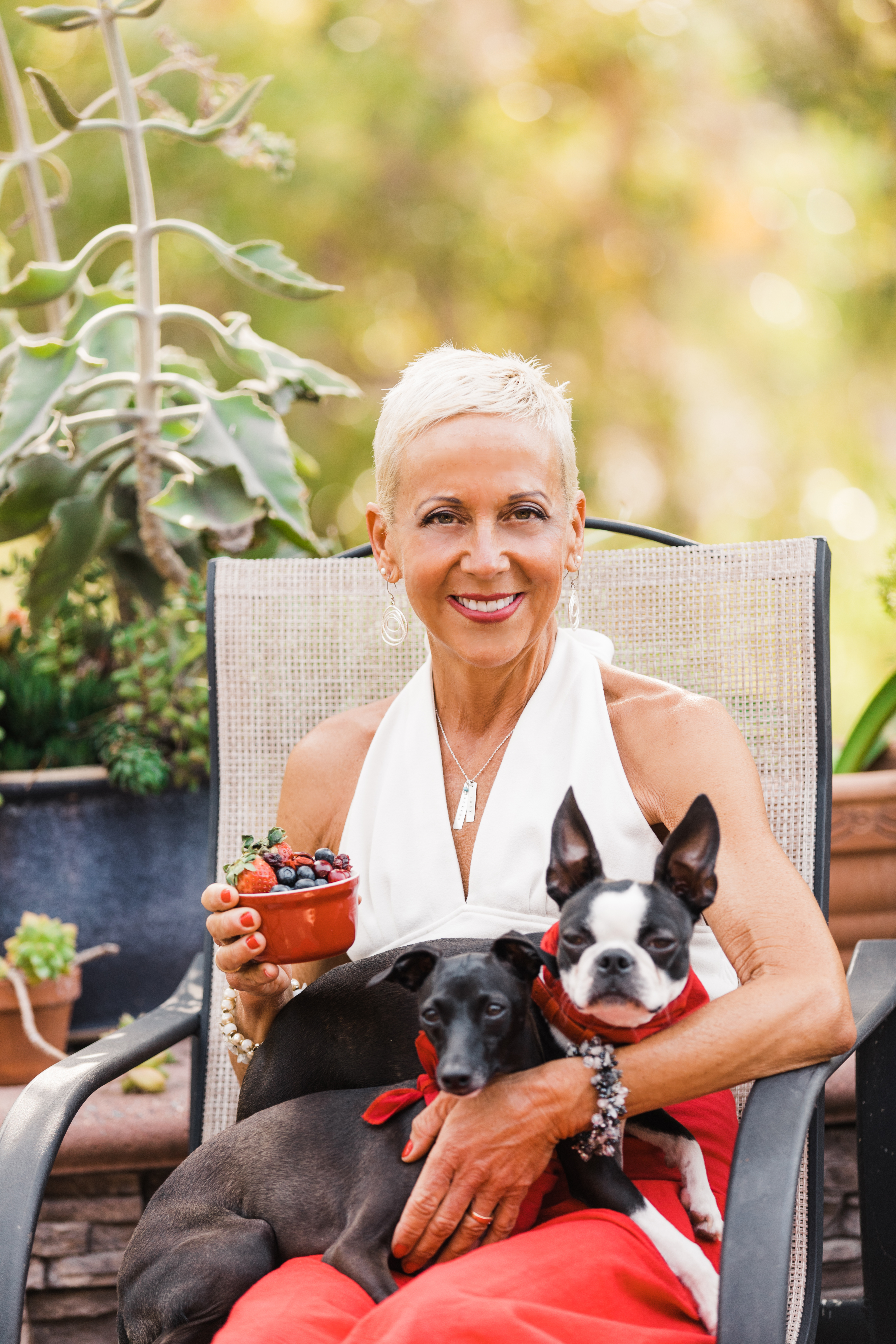 Dr. Dena with two dogs